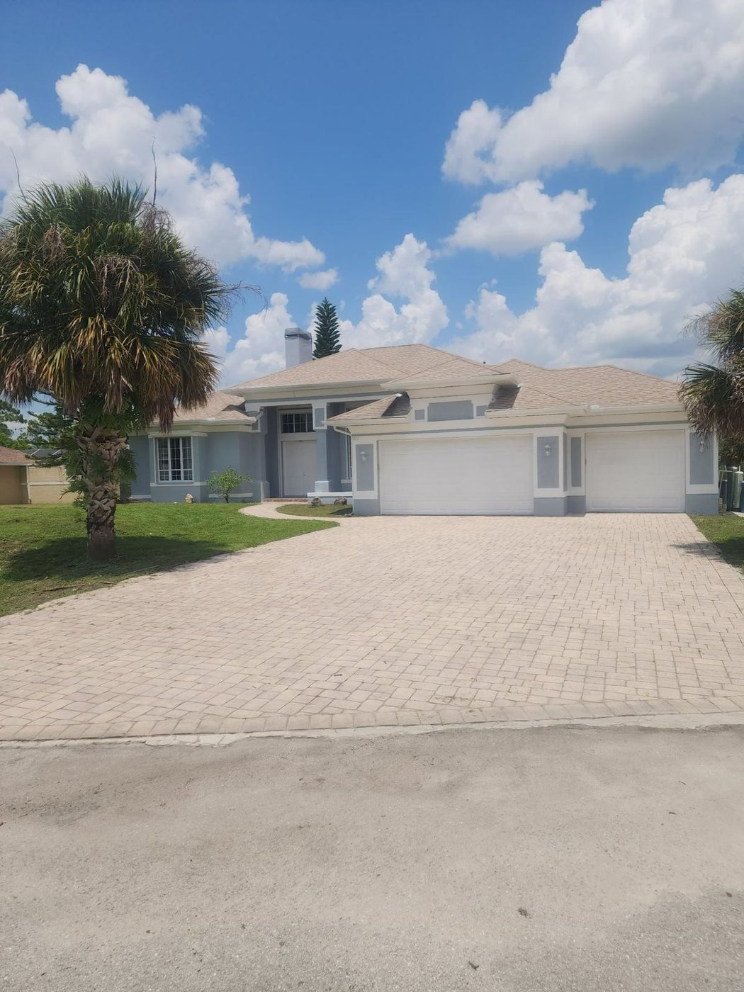 Home exterior after a fresh repaint by Carter Elite Renovations
