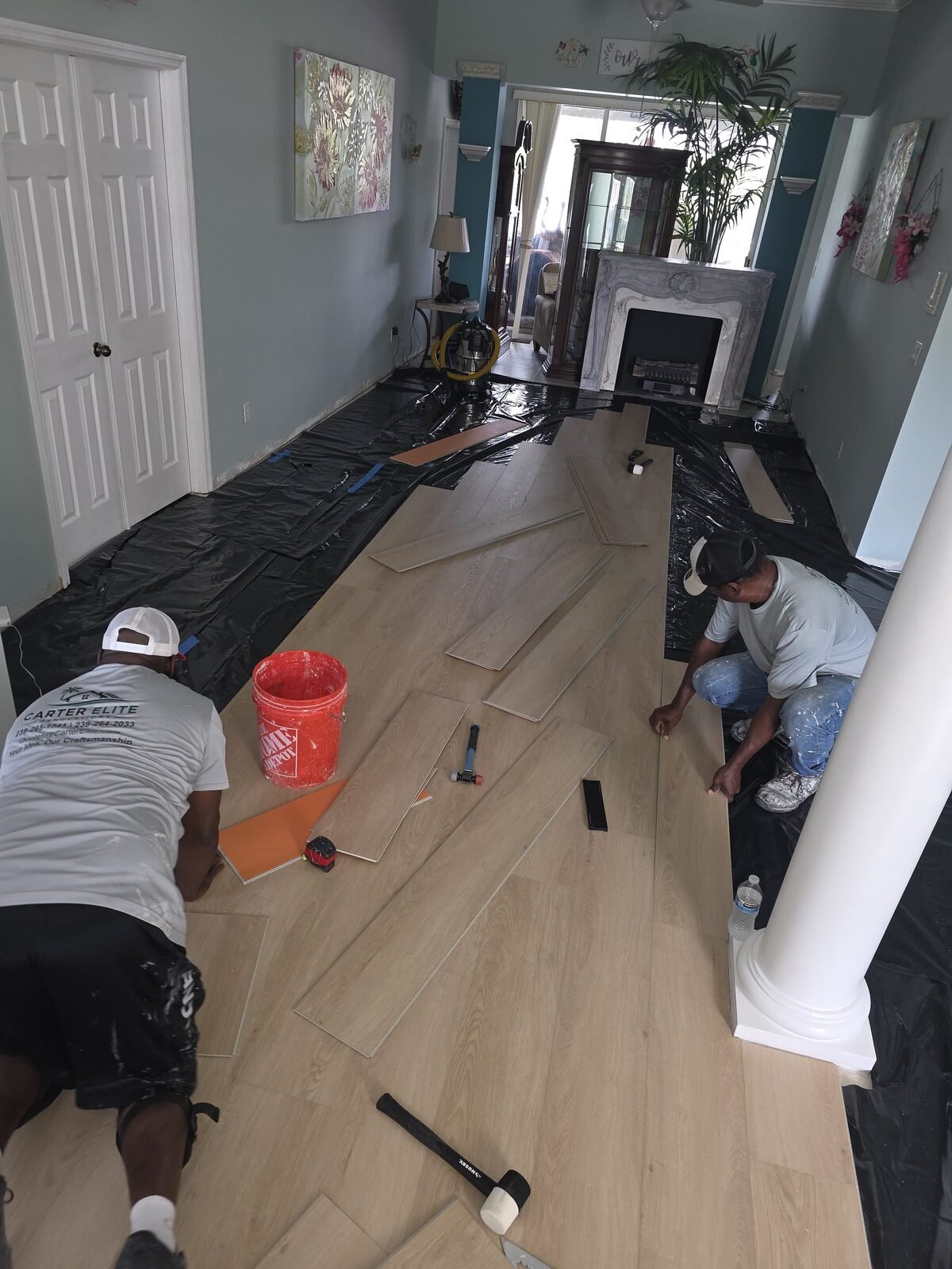 Carter Elite crew installing flooring