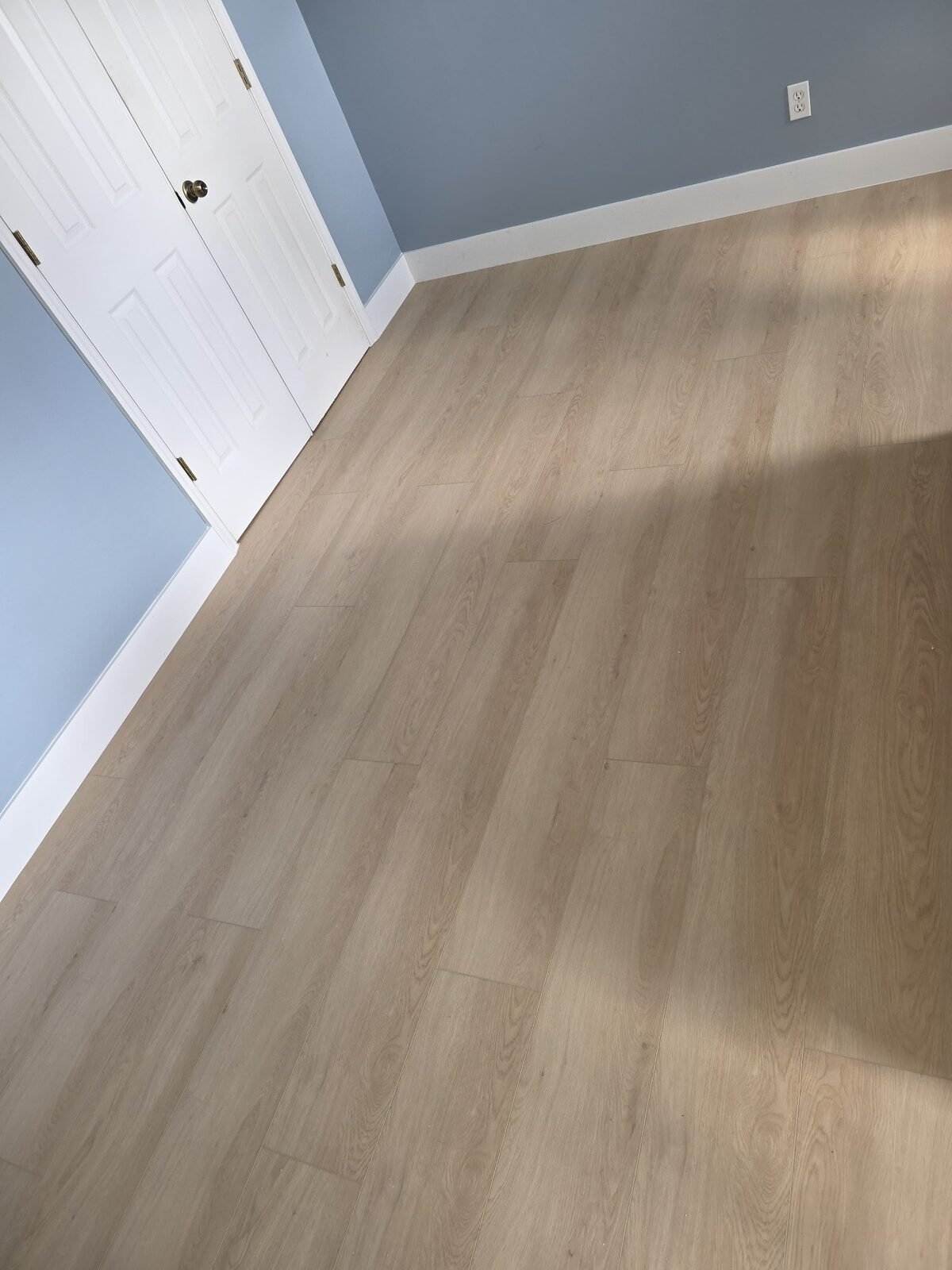 Completed light wood-look LVP flooring